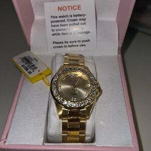 Women’s Invicta watch. Brand new in box, never worn